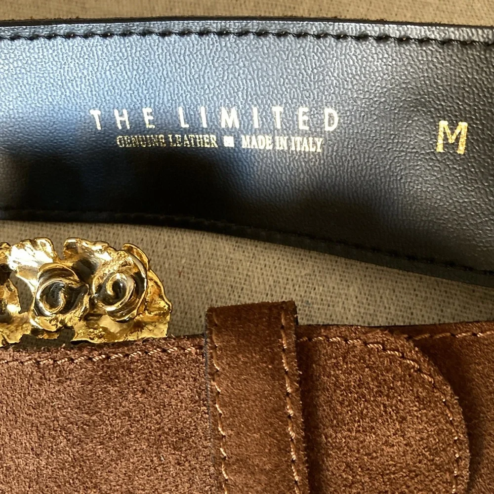 Genuine suede leather belt with one of a kind buckle.